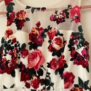 Never worn, pretty dress! Knee length, sleeveless, size 10